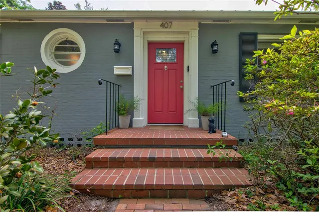 a view of a backyard of the house