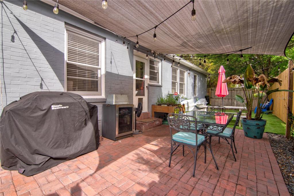 407 Northeast 8th Street Gainesville, FL 32601 - Photo 26 of 32 a building outdoor space with patio furniture and potted plants