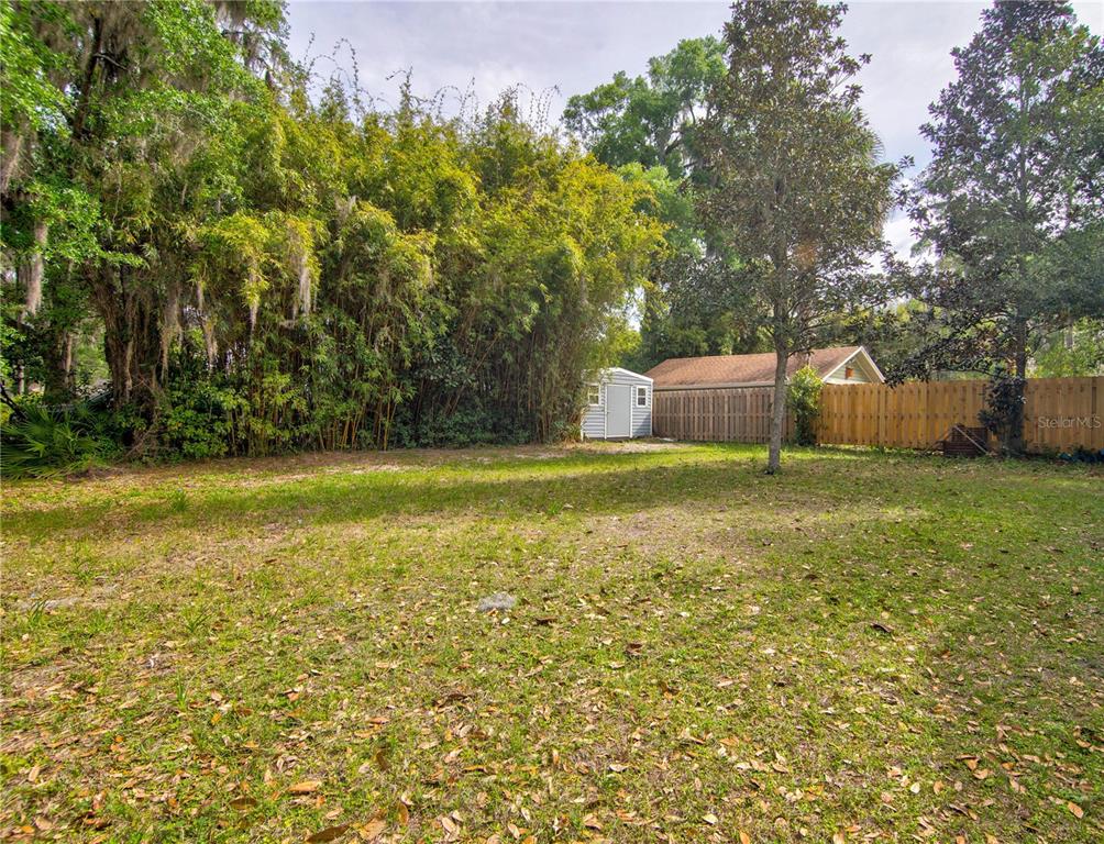 407 Northeast 8th Street Gainesville, FL 32601 - Photo 32 of 32 a view of a swimming pool with an outdoor space and seating area