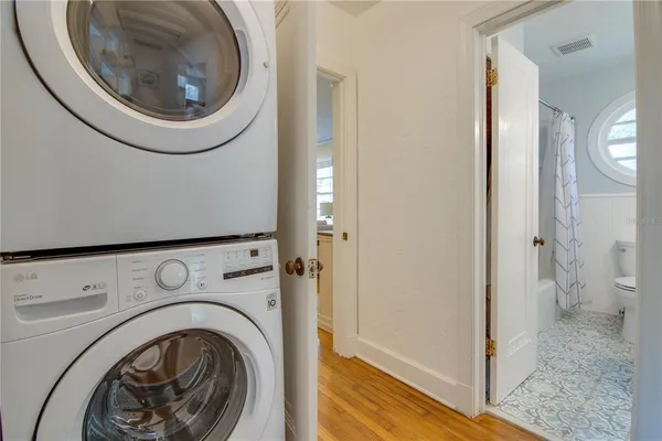 a view of a bathroom with washing machine