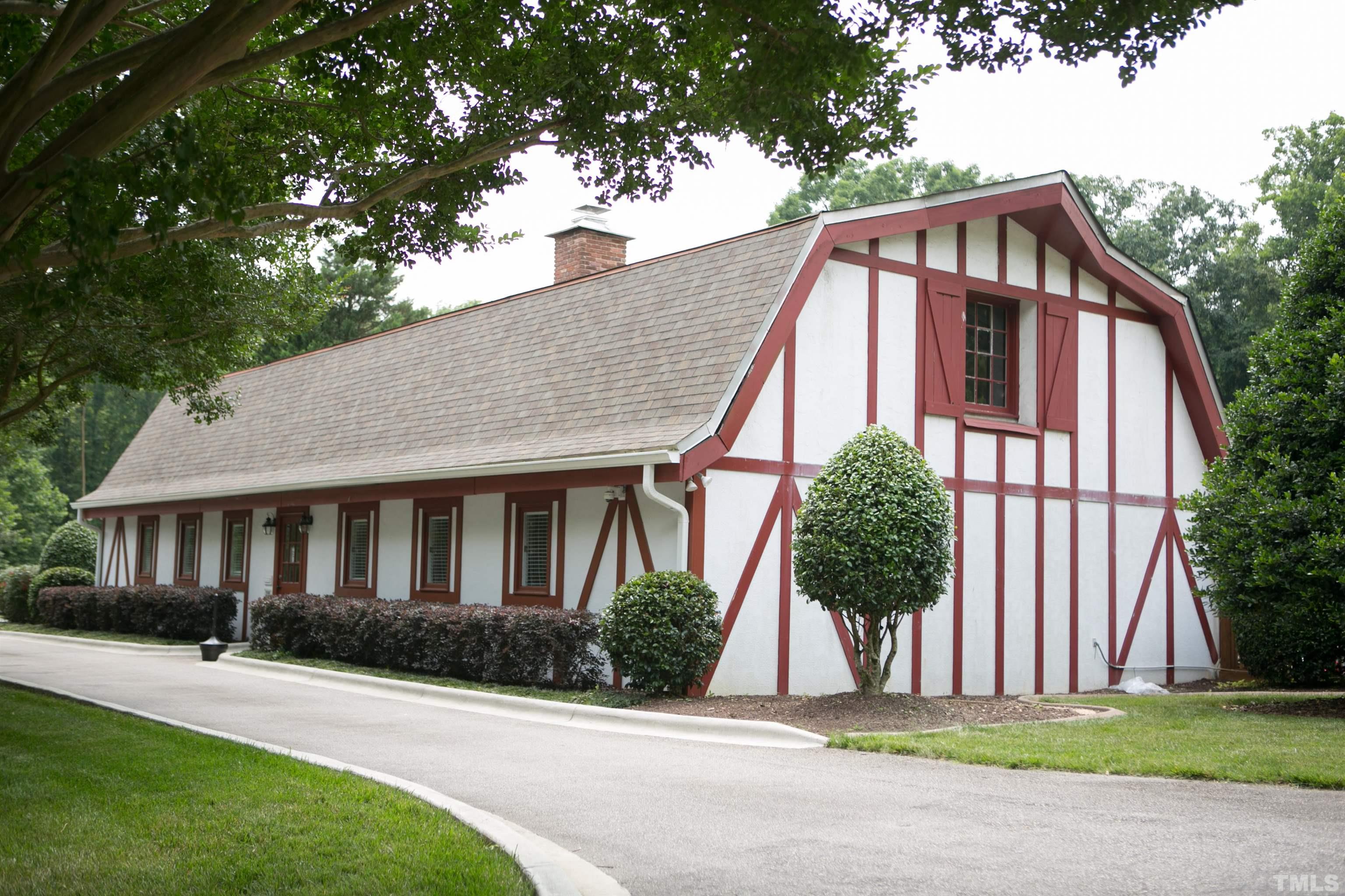 3420 Hackney Court Raleigh, NC 27613 - Photo 37 of 41 a front view of a house with a yard
