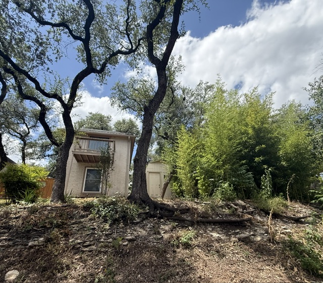 3304 Clawson Road, Unit B Austin, TX 78704 - Photo 11 of 12 A secluded dwelling nestled amidst mature trees offers a private balcony and a separate storage shed.