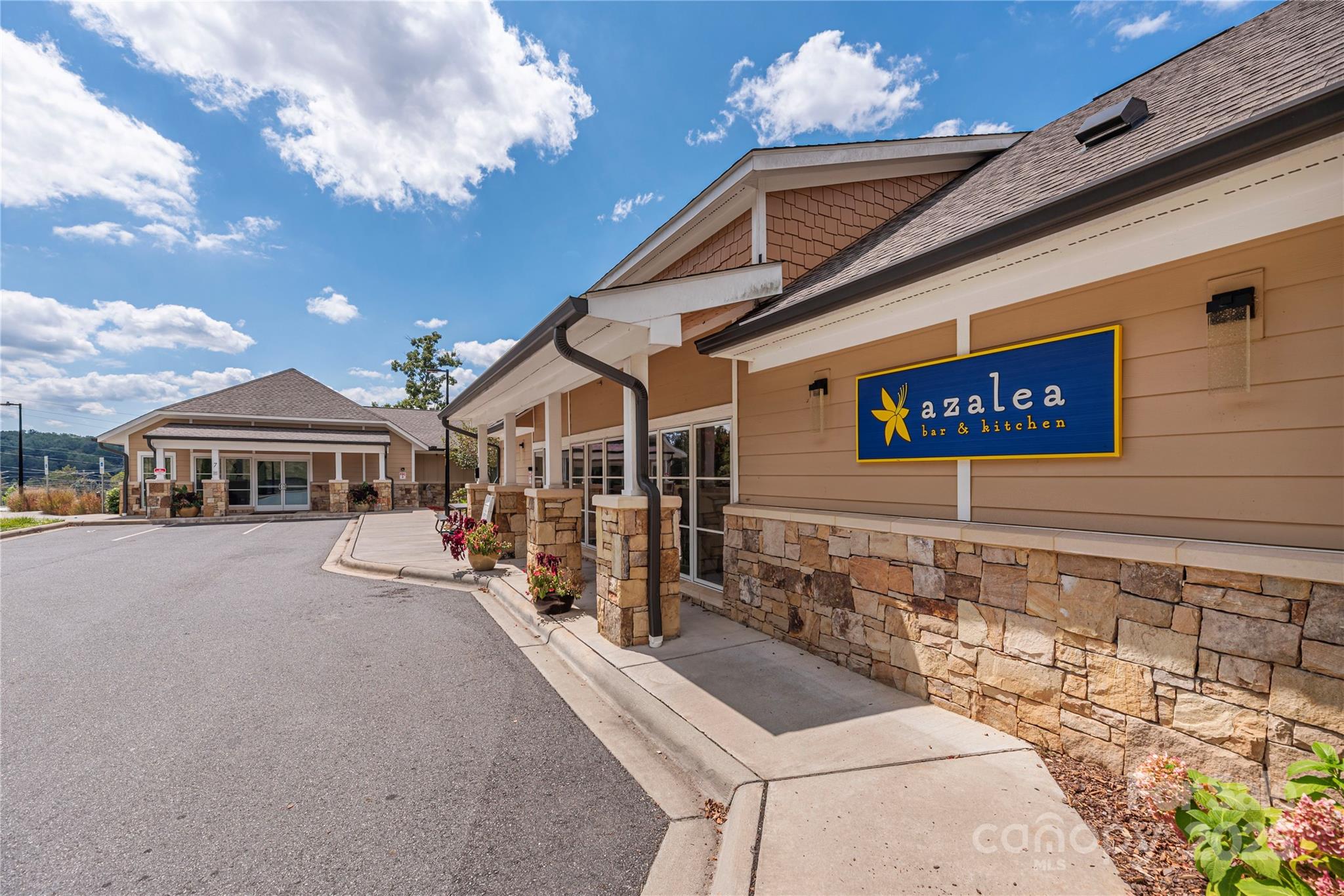 114 Bowling Park Road Asheville, NC 28803 - Photo 16 of 33 a front view of a building with parking space