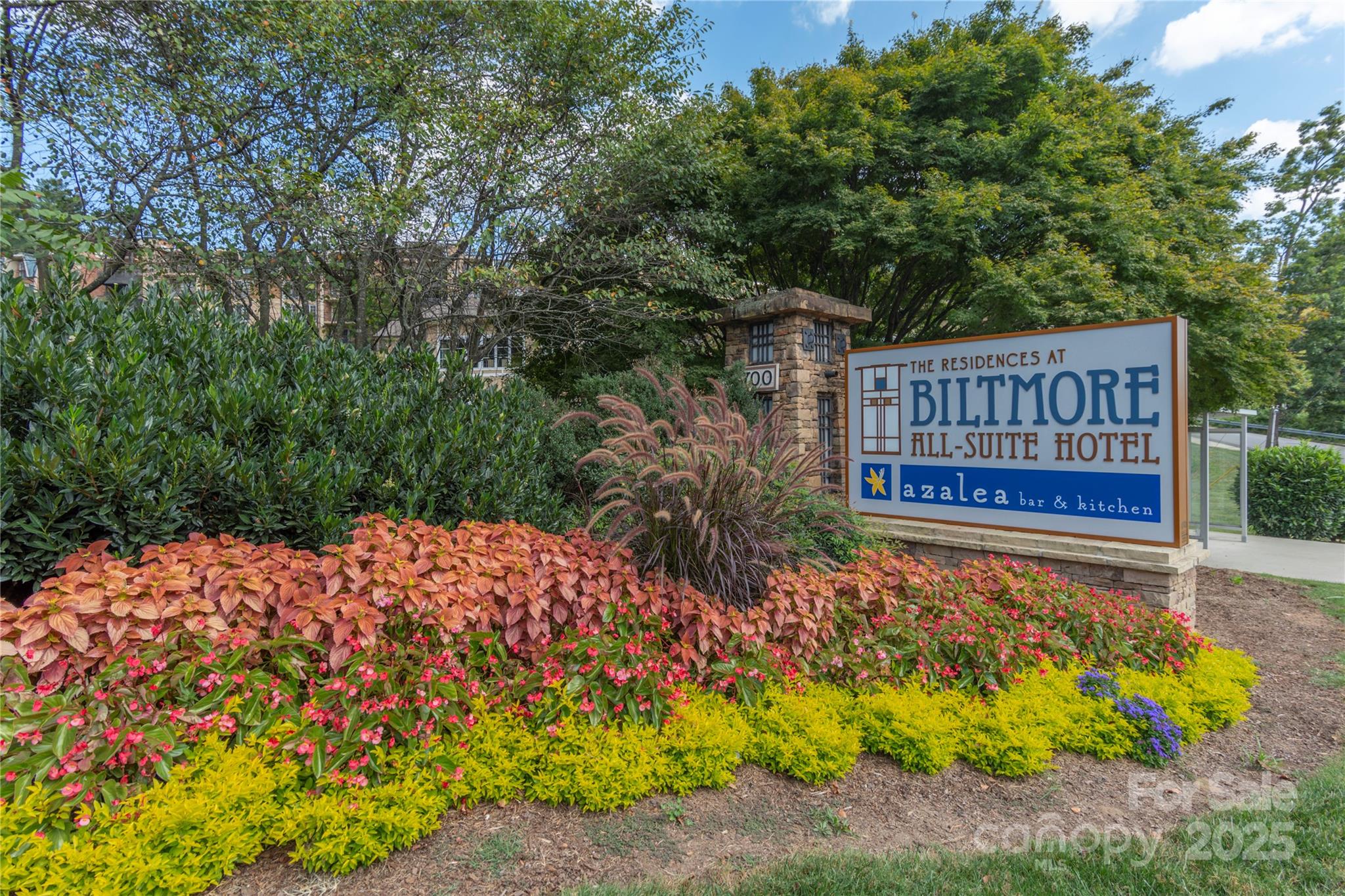 114 Bowling Park Road Asheville, NC 28803 - Photo 27 of 33 a view of a street with flower garden