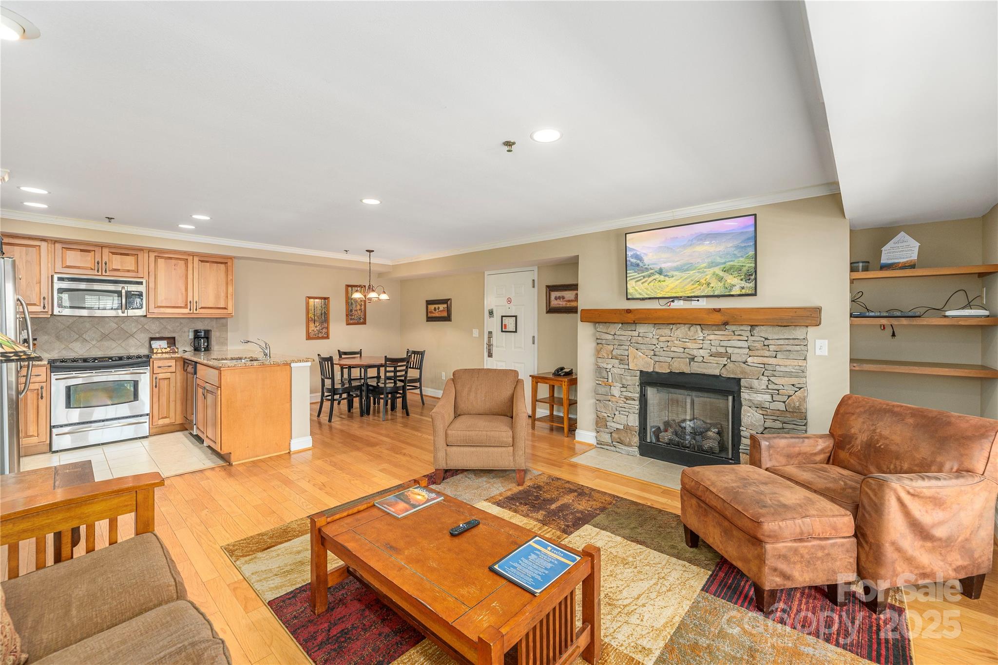 114 Bowling Park Road Asheville, NC 28803 - Photo 7 of 33 a living room with furniture and a fireplace