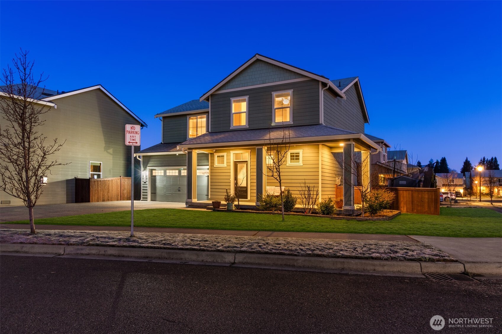985 Riley Drive East Enumclaw, WA 98022 - Photo 28 of 33 a front view of a house with a yard