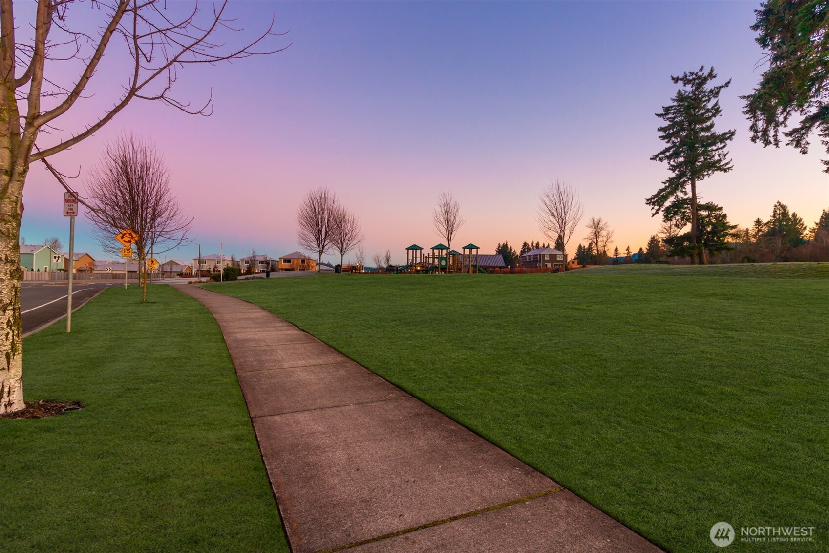 985 Riley Drive East Enumclaw, WA 98022 - Photo 30 of 33 a view of a golf course with a lake
