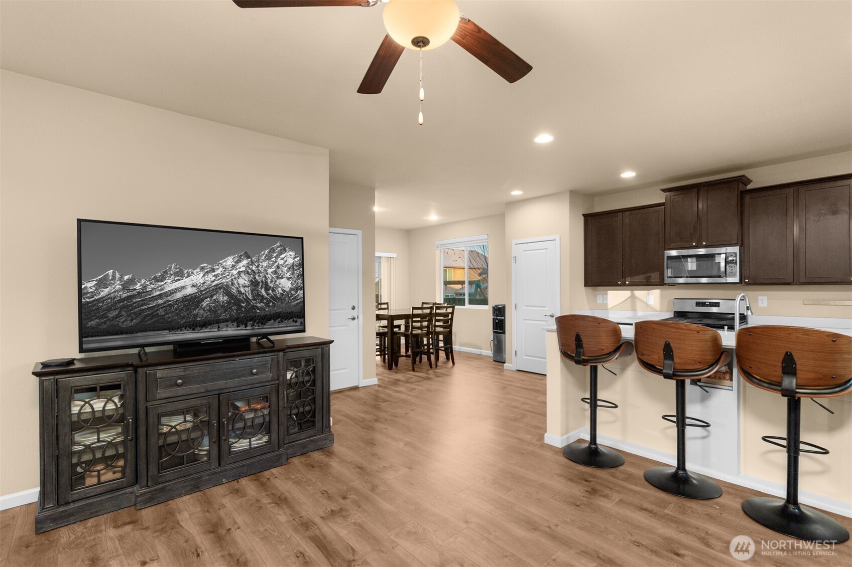 985 Riley Drive East Enumclaw, WA 98022 - Photo 4 of 33 a living room with lots of furniture and kitchen view