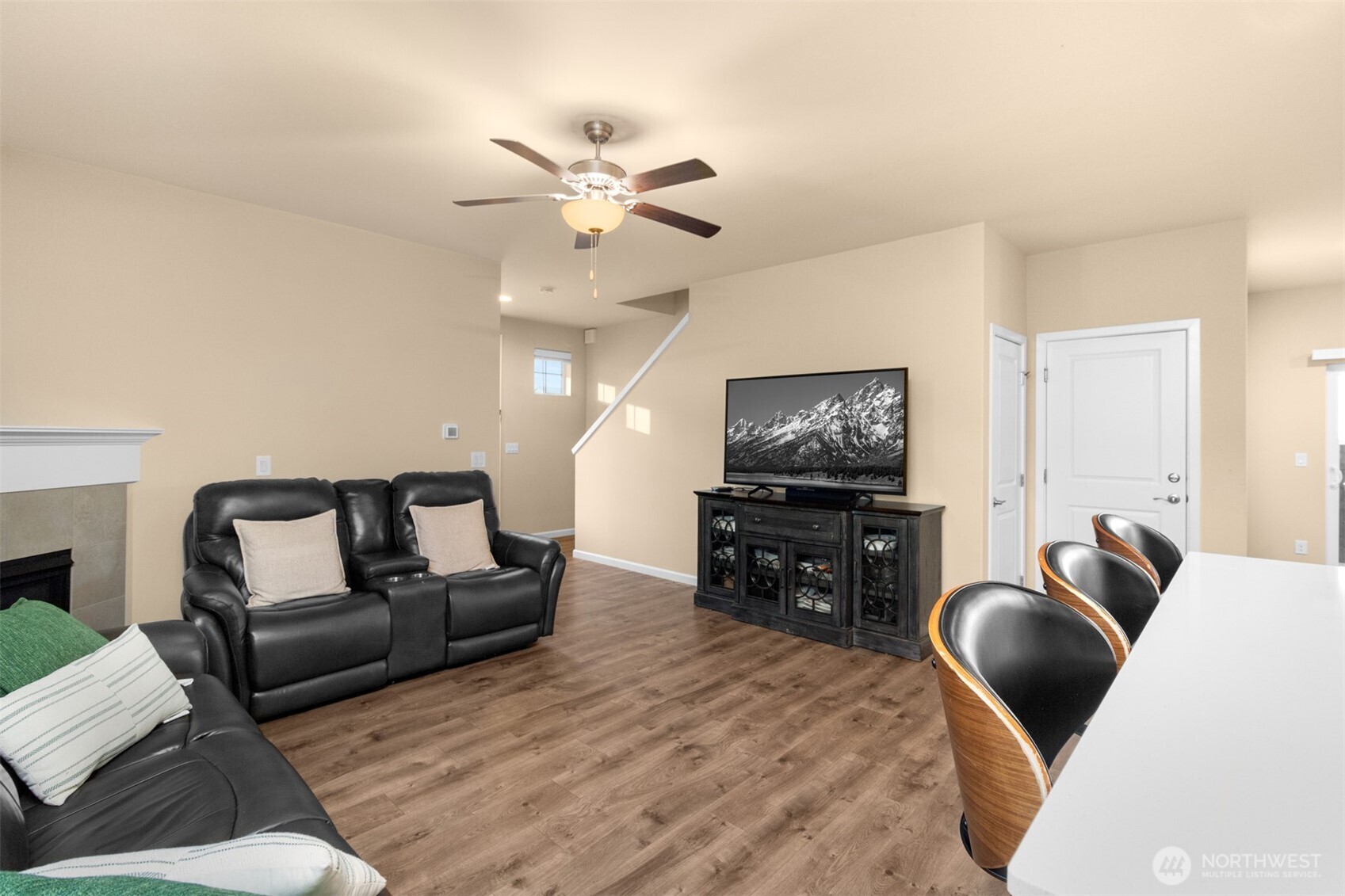 985 Riley Drive East Enumclaw, WA 98022 - Photo 8 of 33 a living room with furniture and a flat screen tv