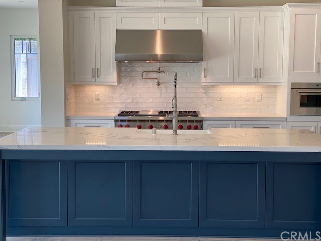 6 Bixby Ranch Road Rolling Hills Estates, CA 90274 - Photo 1 of 1 Completely Customized Kitchen with Subzero appliances, upgraded white cabinets, upgraded Quartz countertops, upgraded porcelain sink, farmhouse faucet, and pot filler.