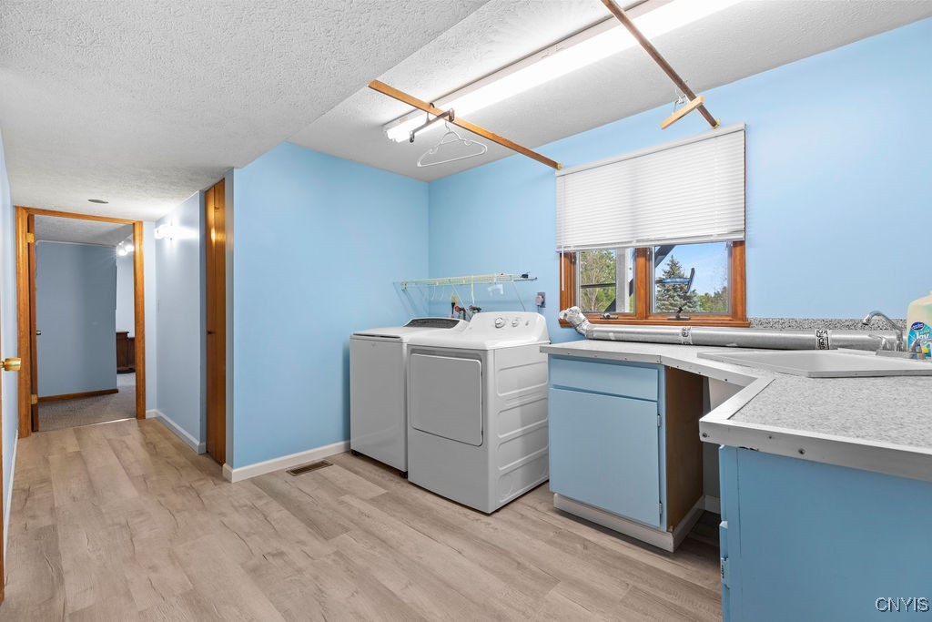 4278 Makyes Road Onondaga, NY 13215 - Photo 37 of 50 Laundry room off the ground floor living room.