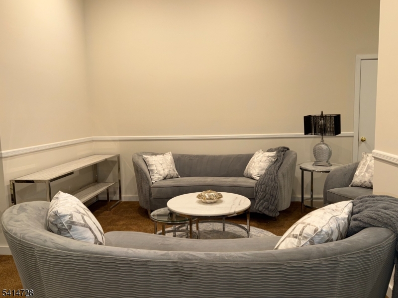 8 Union Hill Road Denville, NJ 07834 - Photo 31 of 47 a living room with furniture and a couch