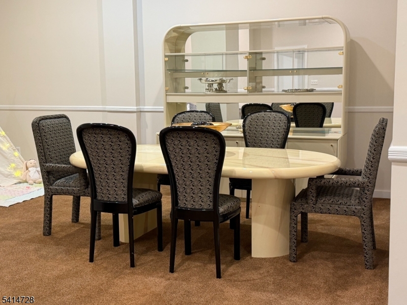 8 Union Hill Road Denville, NJ 07834 - Photo 35 of 47 a view of a dining room with furniture and window