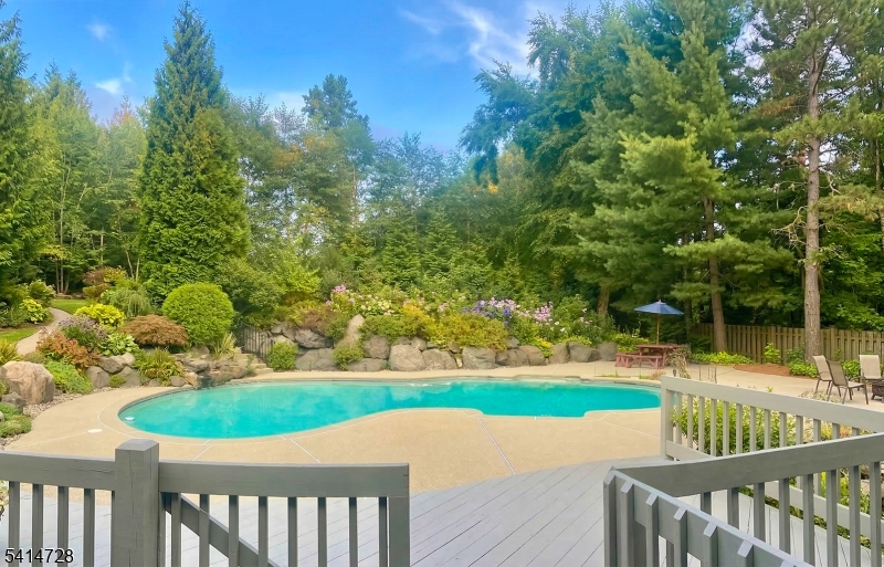 8 Union Hill Road Denville, NJ 07834 - Photo 4 of 47 a view of a bench and trees in the park