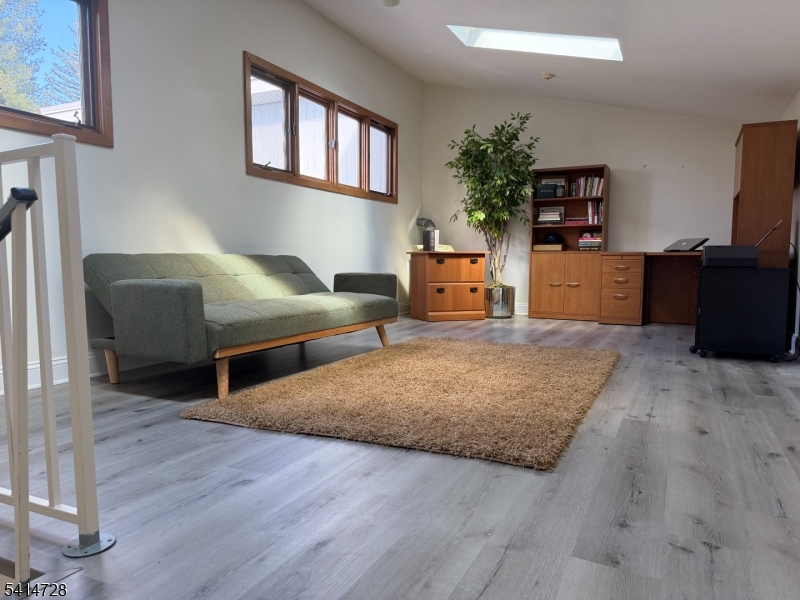 8 Union Hill Road Denville, NJ 07834 - Photo 41 of 47 a living room with furniture and a kitchen view