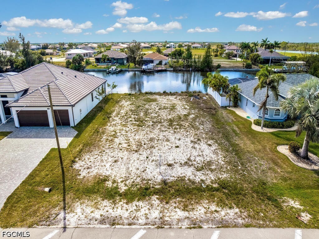 1702 Old Burnt Store Road North Cape Coral, FL 33993 - Photo 2 of 14 a view of a lake