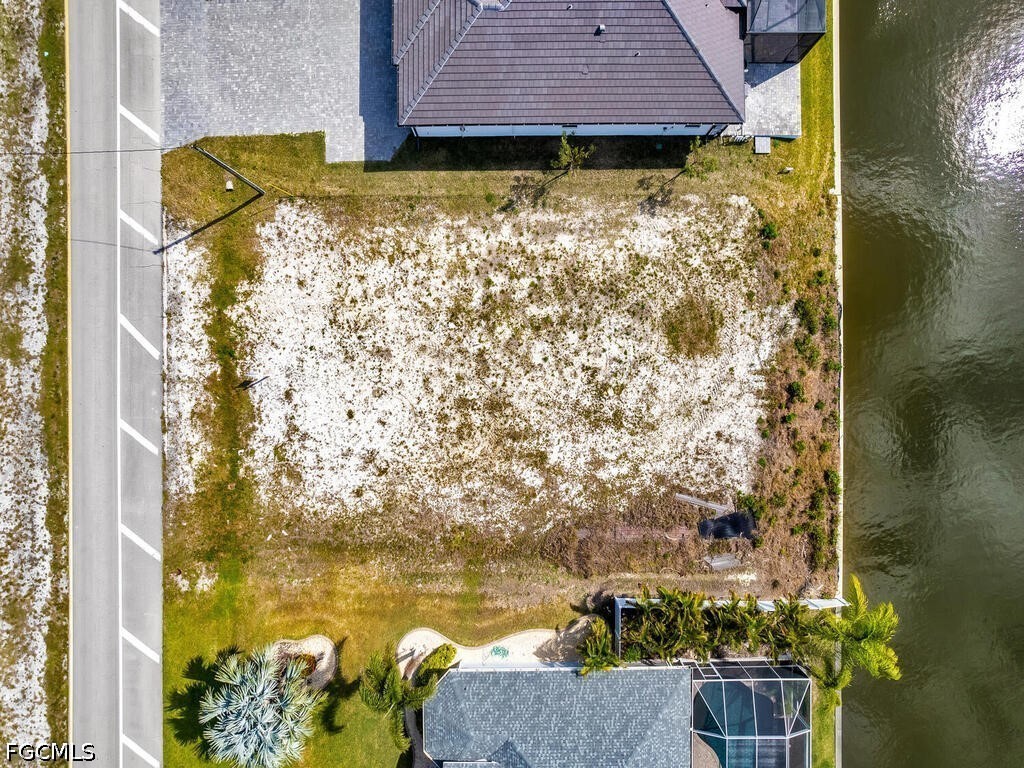 1702 Old Burnt Store Road North Cape Coral, FL 33993 - Photo 4 of 14 a view of door of house with wooden floor