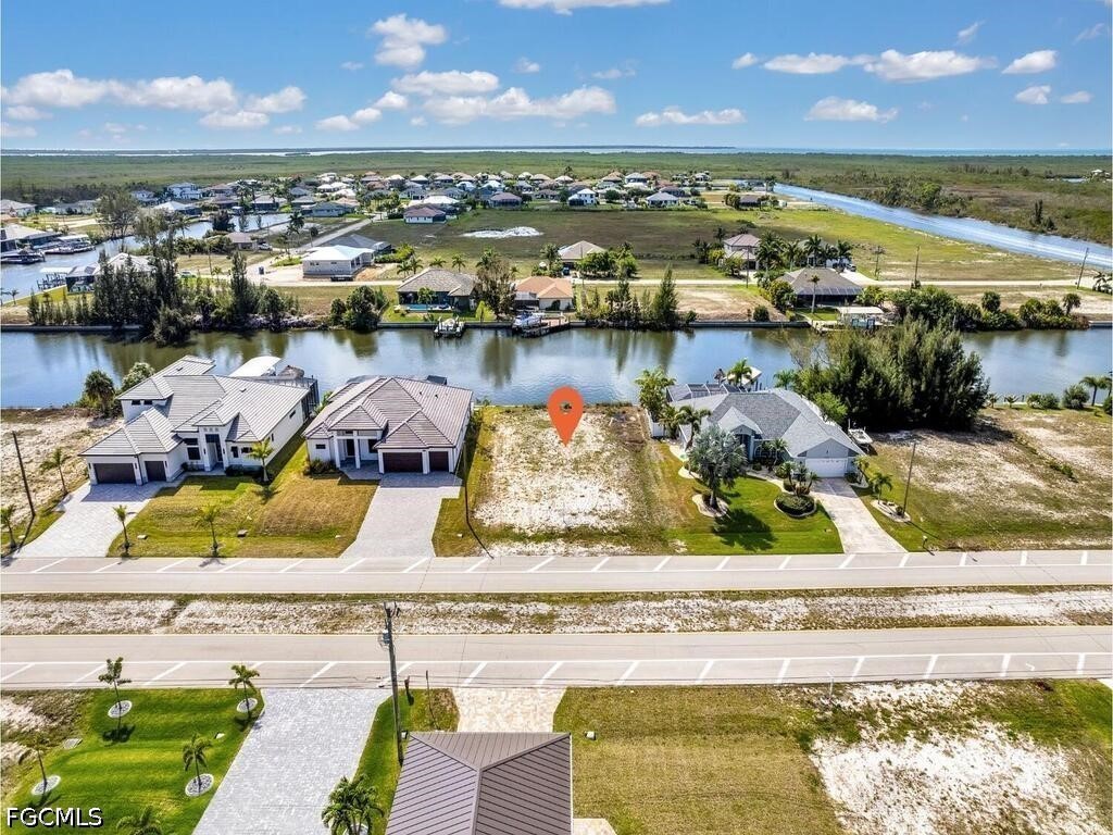 1702 Old Burnt Store Road North Cape Coral, FL 33993 - Photo 5 of 14 a view of a swimming pool