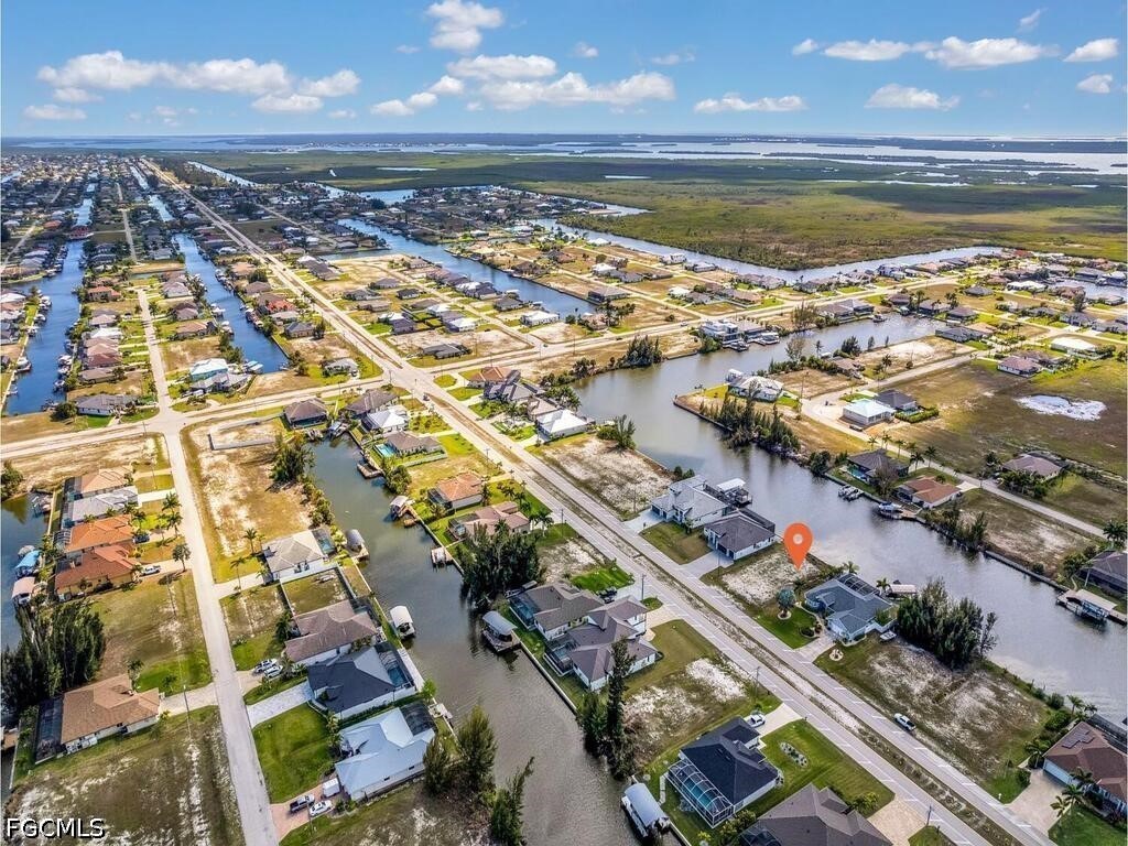 1702 Old Burnt Store Road North Cape Coral, FL 33993 - Photo 8 of 14 a view of a city with an ocean