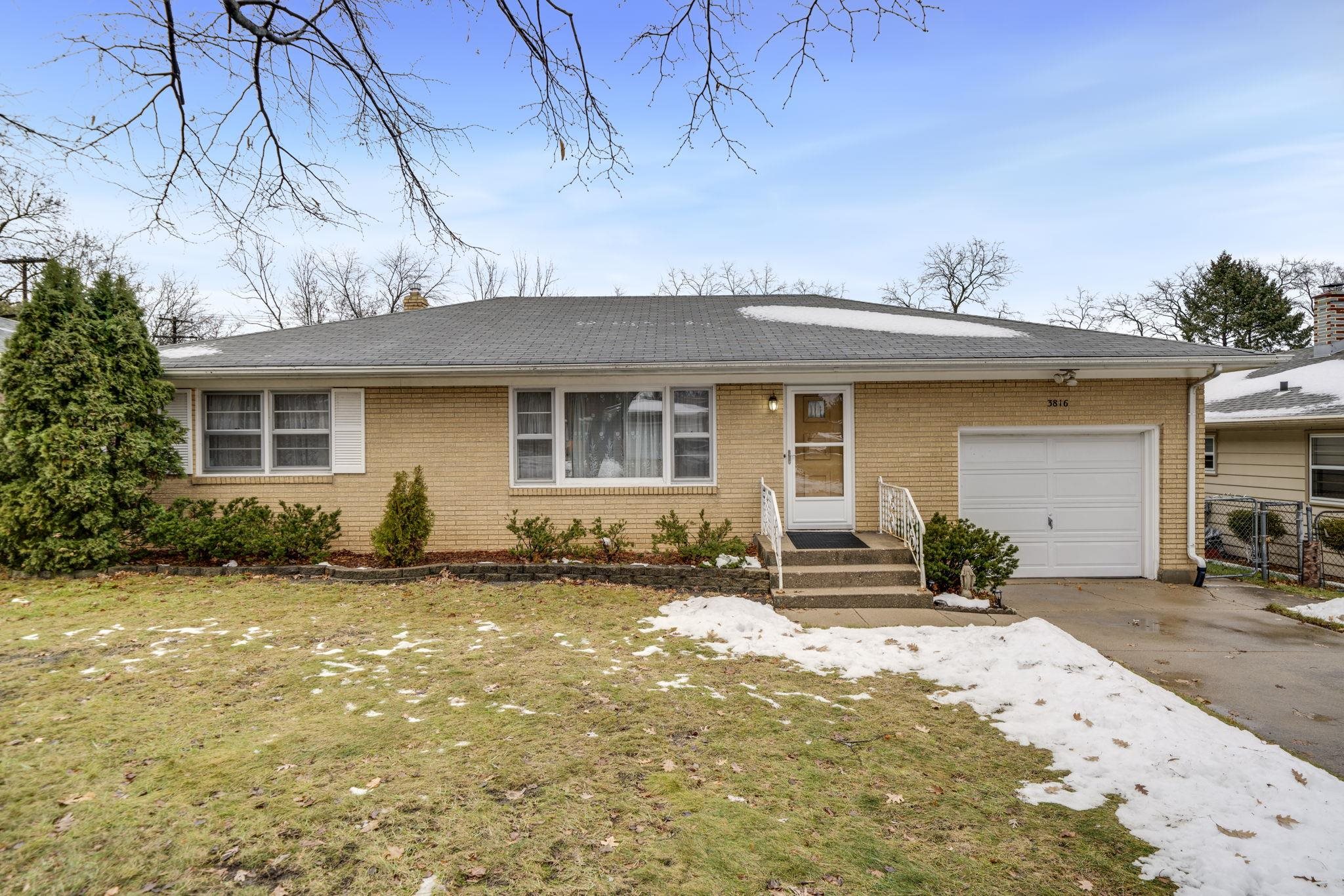 3816 Shirley Road Rockford, IL 61108 - Photo 25 of 31 a front view of a house with yard patio and fire pit