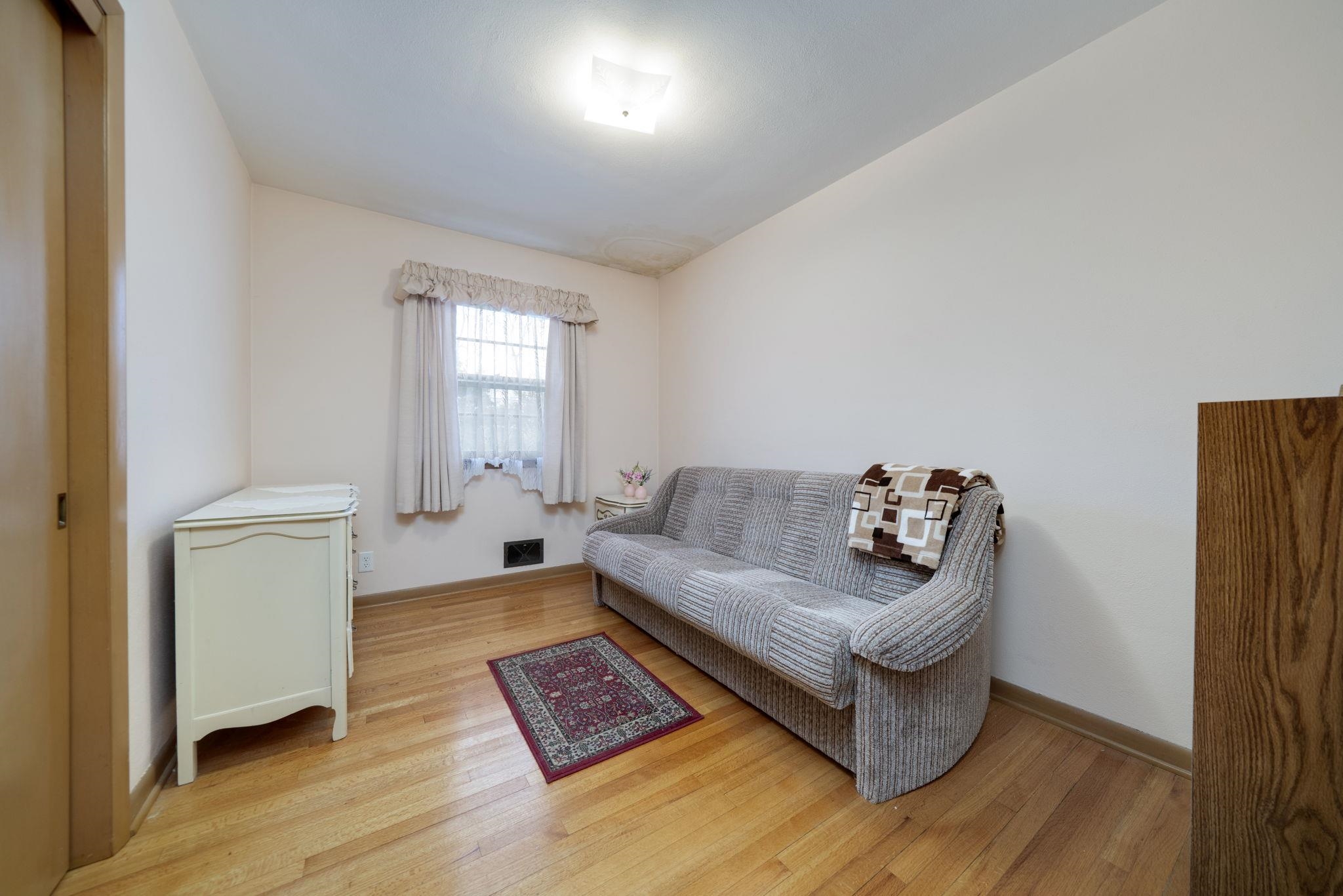 3816 Shirley Road Rockford, IL 61108 - Photo 6 of 31 a living room with furniture and a window