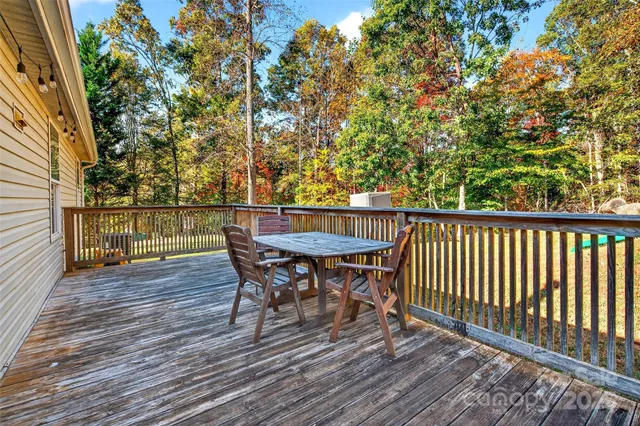 a view of a chairs and table on the wooden floor