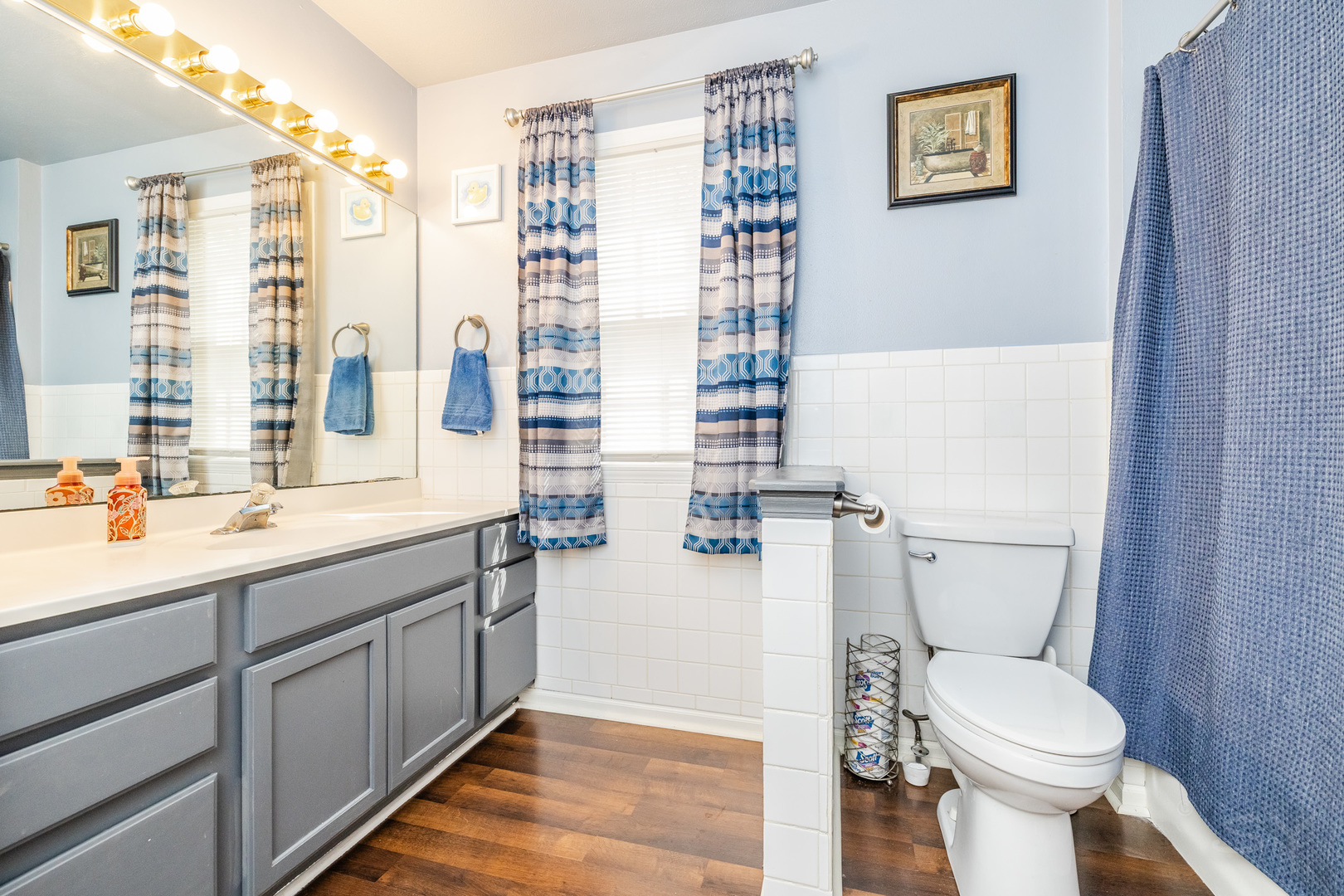 6038 Nimtz Road Loves Park, IL 61111 - Photo 19 of 26 a bathroom with a sink toilet and shower