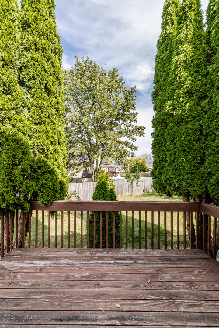 6038 Nimtz Road Loves Park, IL 61111 - Photo 22 of 26 a view of a wooden fence