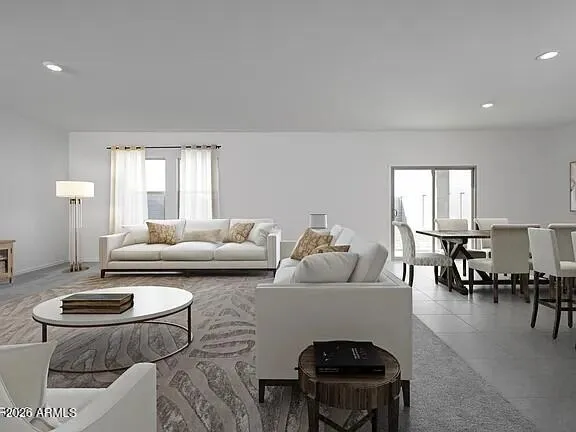 a living room with furniture and a table