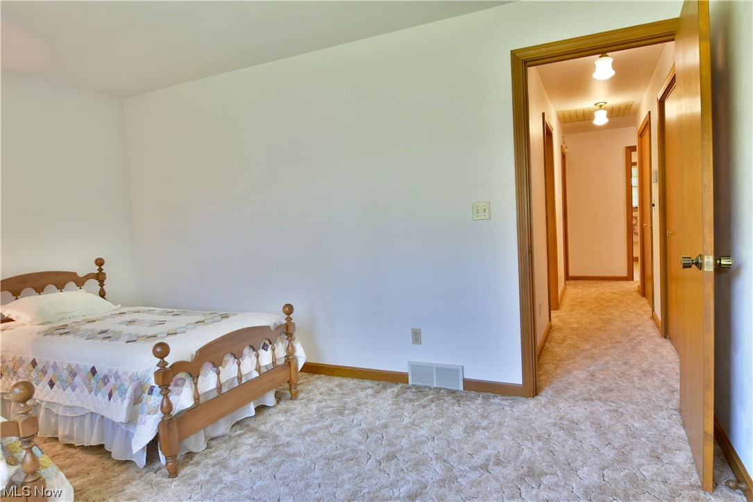 1943 Kale Adams Road Southwest Warren, OH 44481 - Photo 28 of 35 View of carpeted bedroom