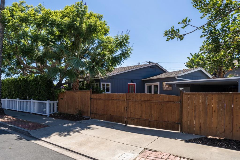 5504 Linda Rosa Avenue La Jolla, CA 92037 - Photo 21 of 24 a front view of a house with a garage