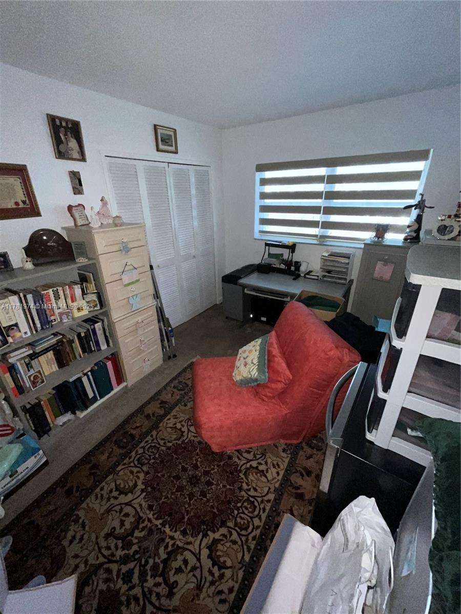 651 Pine Drive, Unit 305 Pompano Beach, FL 33060 - Photo 17 of 21 a bathroom with a sink and a mirror
