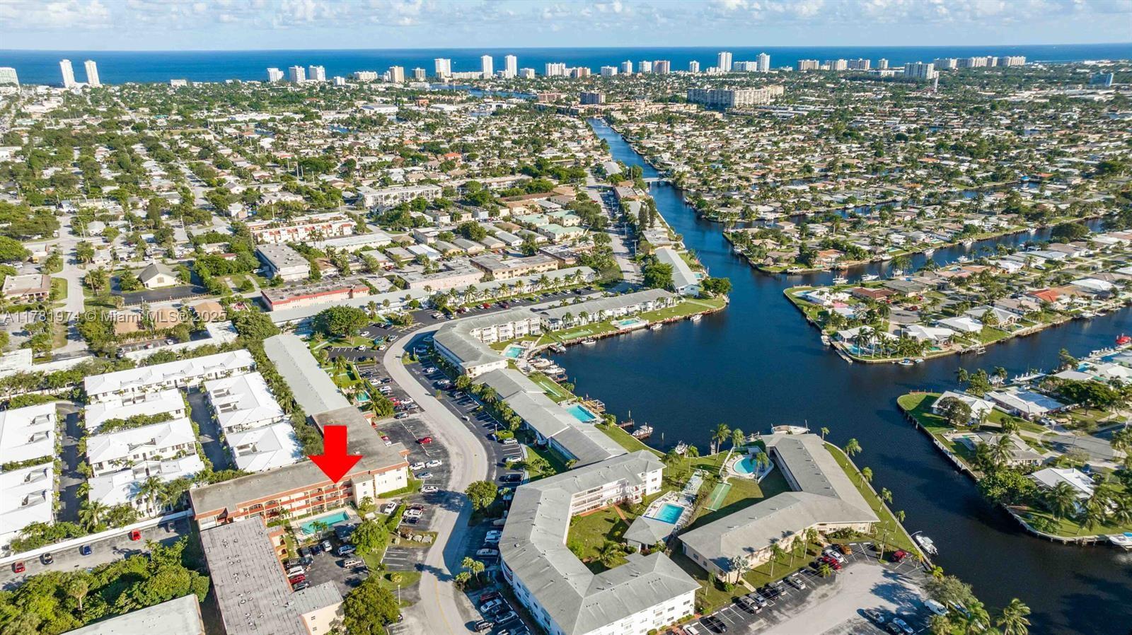 651 Pine Drive, Unit 305 Pompano Beach, FL 33060 - Photo 4 of 21 view of a balcony with wooden floor