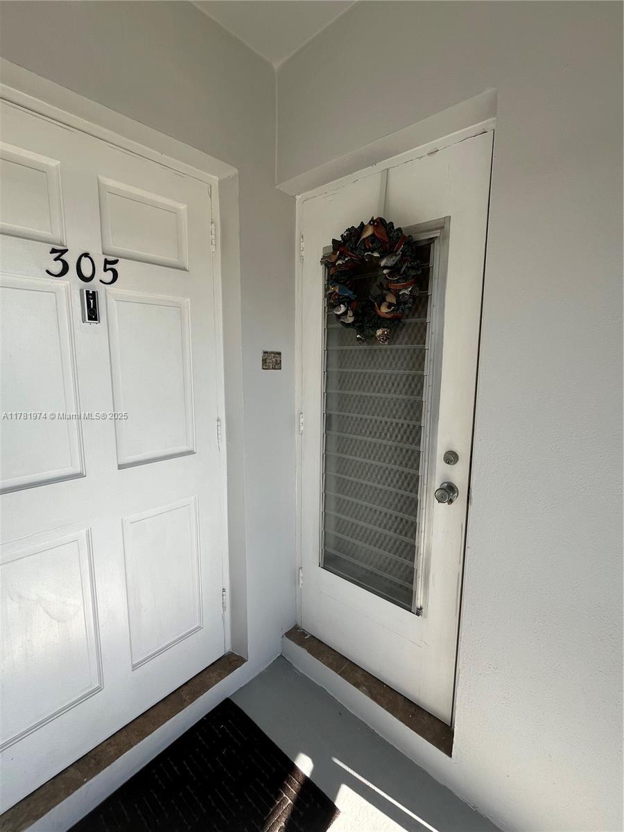 651 Pine Drive, Unit 305 Pompano Beach, FL 33060 - Photo 9 of 21 a view of an entryway