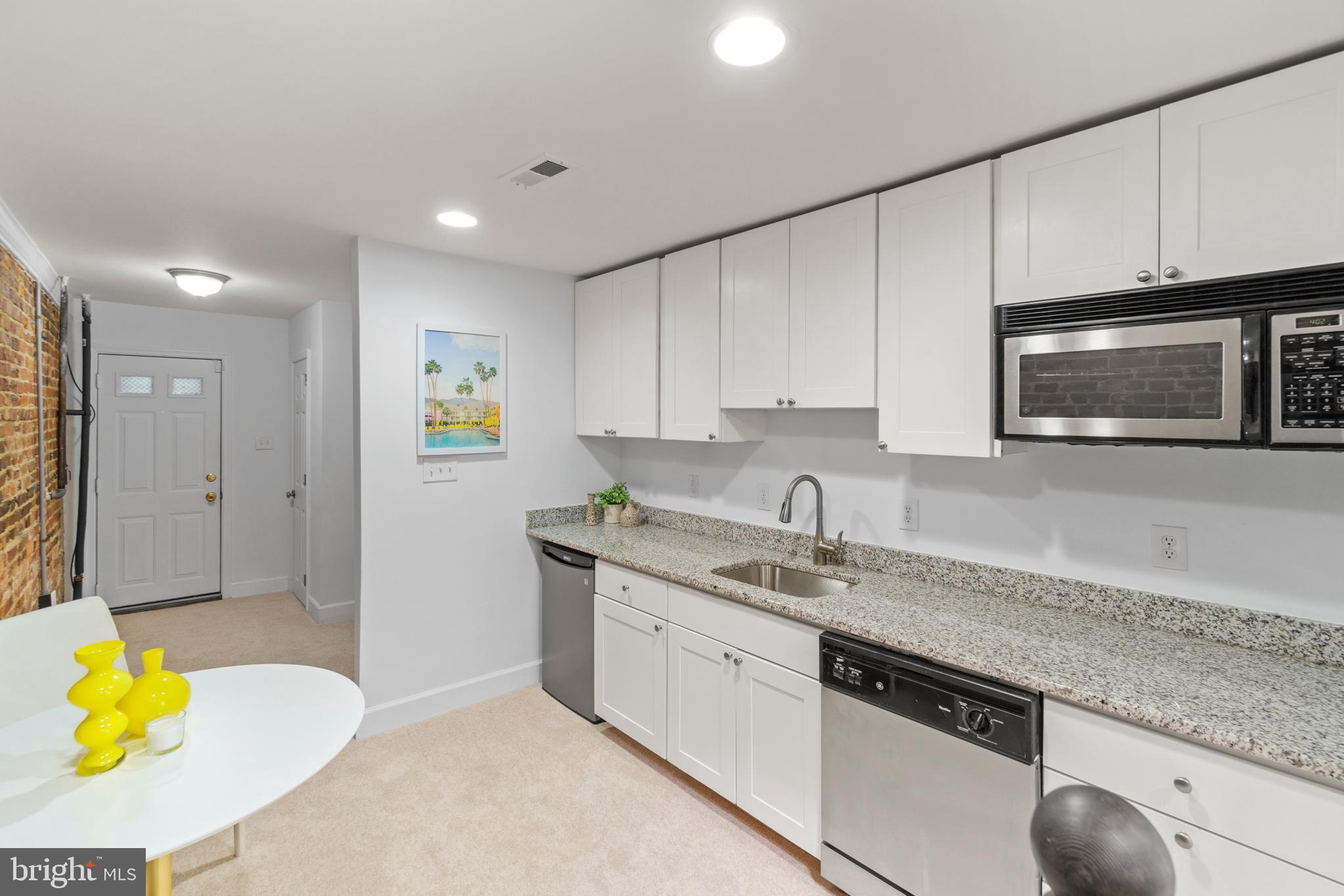 1229 Morse Street Northeast Washington, DC 20002 - Photo 17 of 38 Basement kitchenette looking towards front door