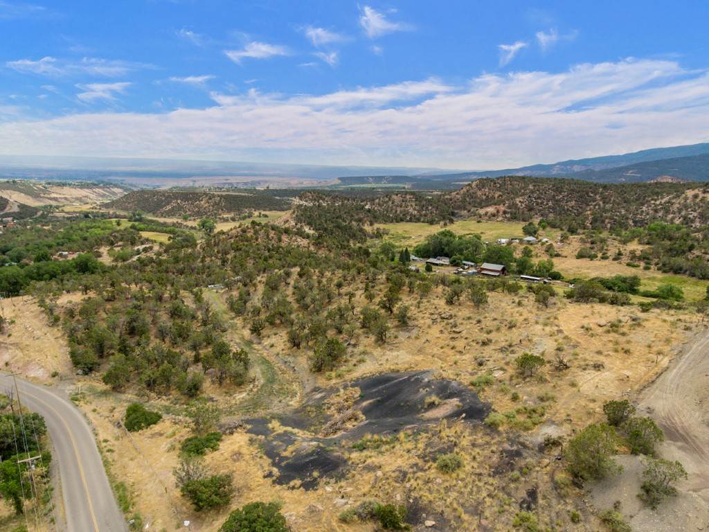 19069 Green Valley Road Cedaredge, CO 81413 - Photo 24 of 34 view of city and mountain