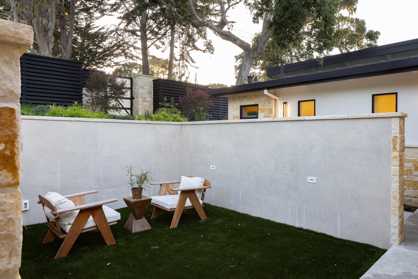 2931 Sloat Road Pebble Beach, CA 93953 - Photo 26 of 34 a backyard of a house with table and chairs