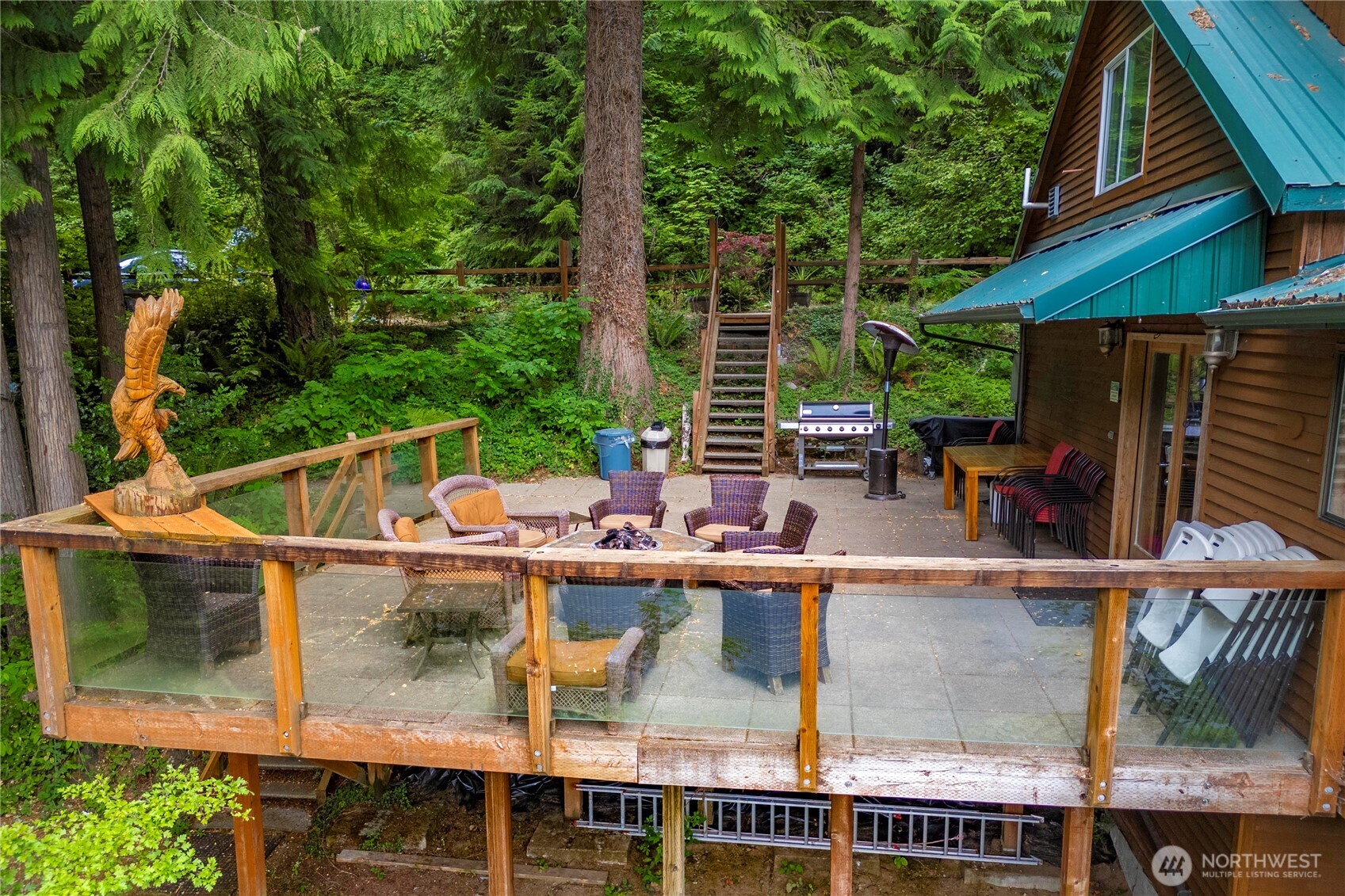 1546 Reservation Road Southeast, Unit 62 Olympia, WA 98513 - Photo 27 of 39 a view of backyard with swimming pool and outdoor seating