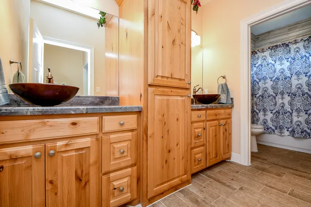 a view of bathroom with dual sinks
