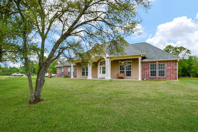 front view of a house and a garden