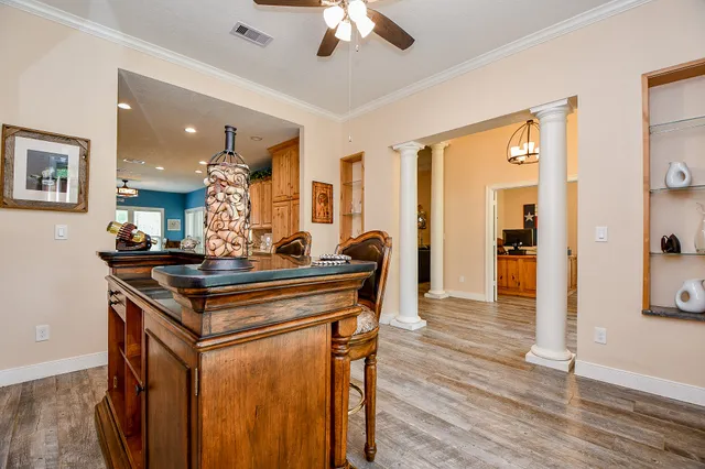 a kitchen with stainless steel appliances granite countertop a stove and a refrigerator
