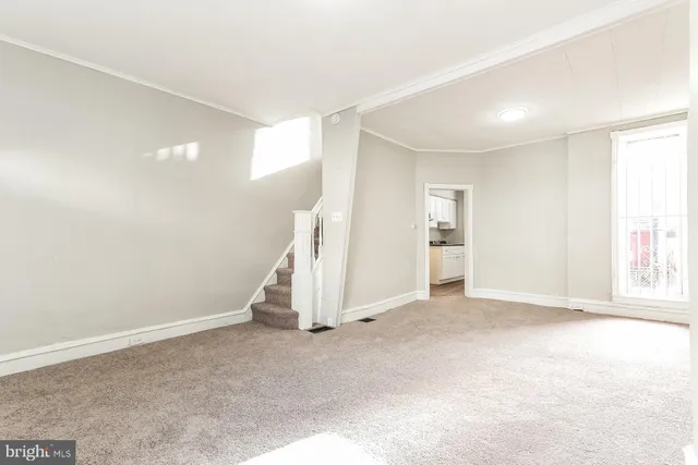 an empty room with windows