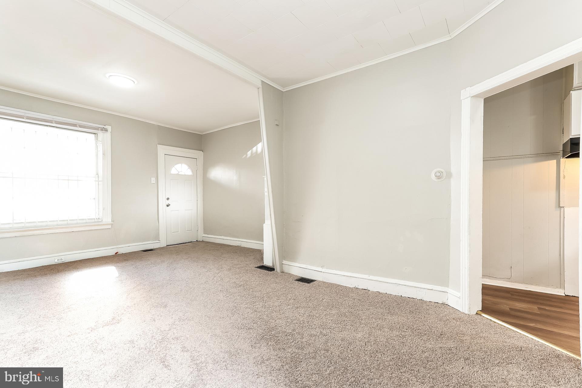 5416 Spring Street Philadelphia, PA 19139 - Photo 4 of 12 an empty room with windows and closet