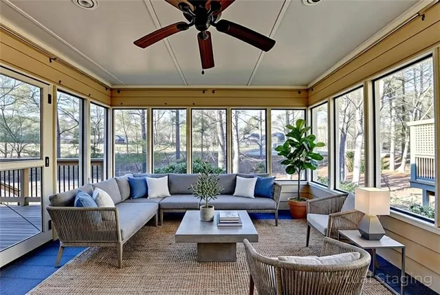 a kitchen with stainless steel appliances granite countertop a sink dishwasher stove and refrigerator with wooden floor