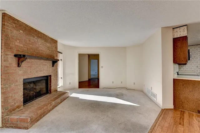 a bathroom with a shower and toilet