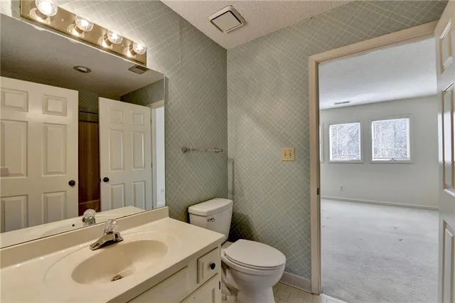 a view of a backyard of the house