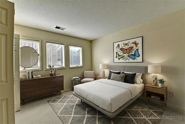 a view of road with large trees