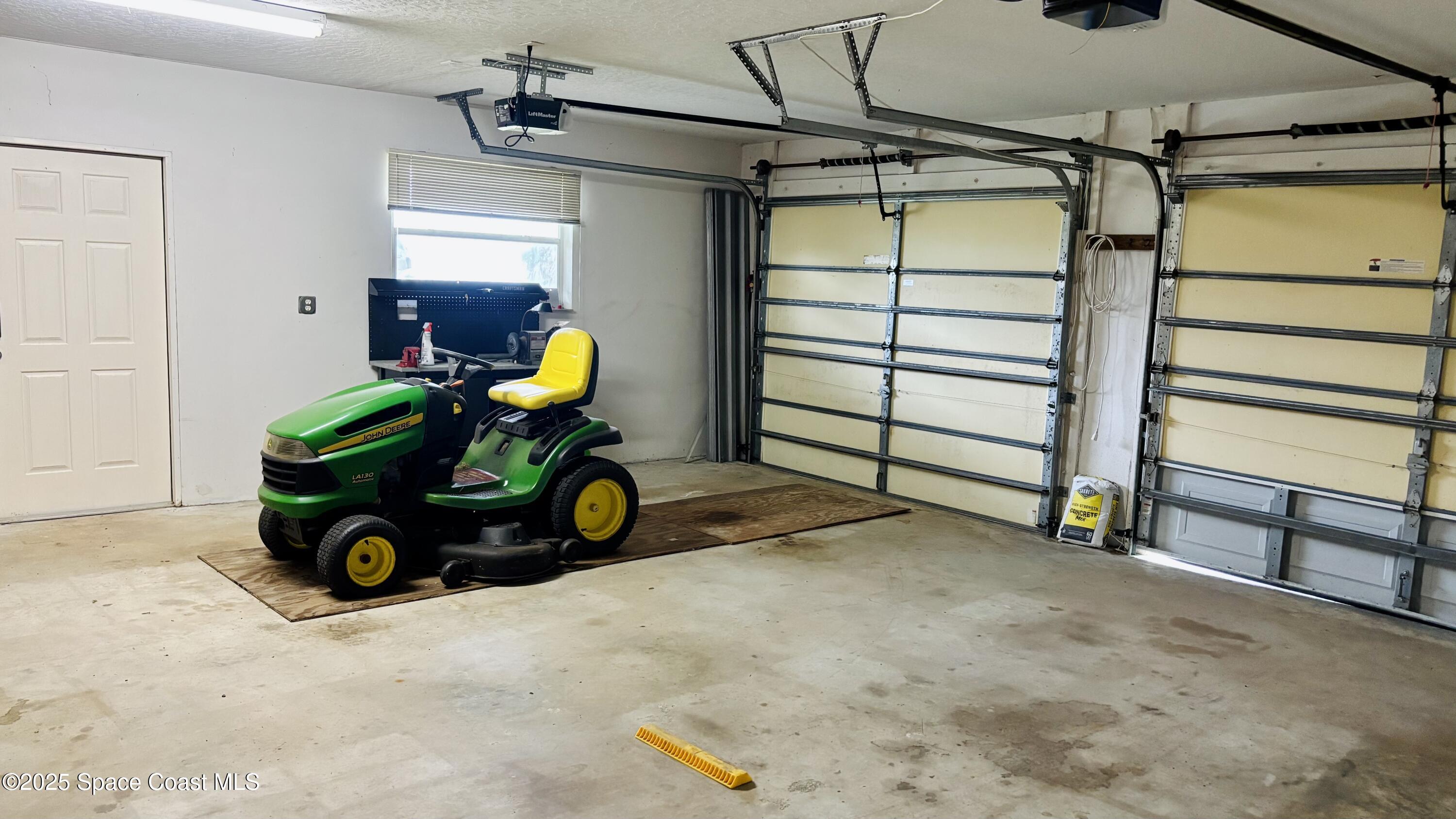 5508 Ambersand Place Grant-Valkaria, FL 32949 - Photo 23 of 30 a view of garage