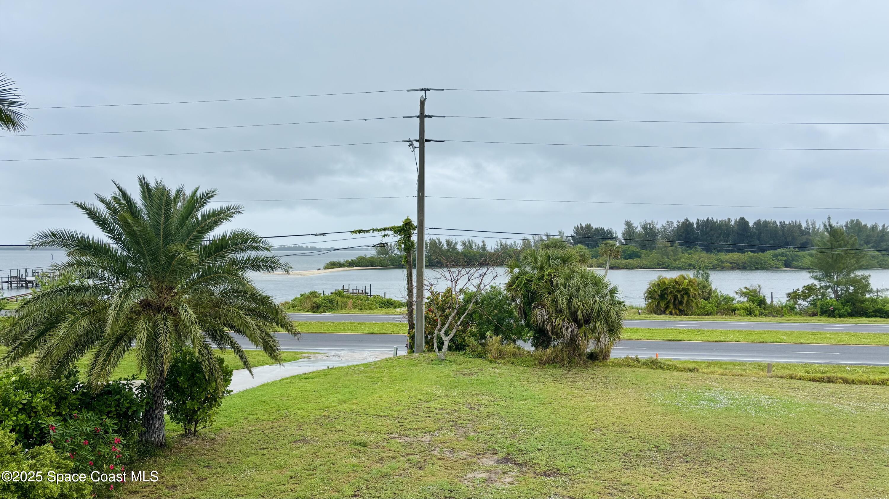 5508 Ambersand Place Grant-Valkaria, FL 32949 - Photo 28 of 30 a house view with a garden space