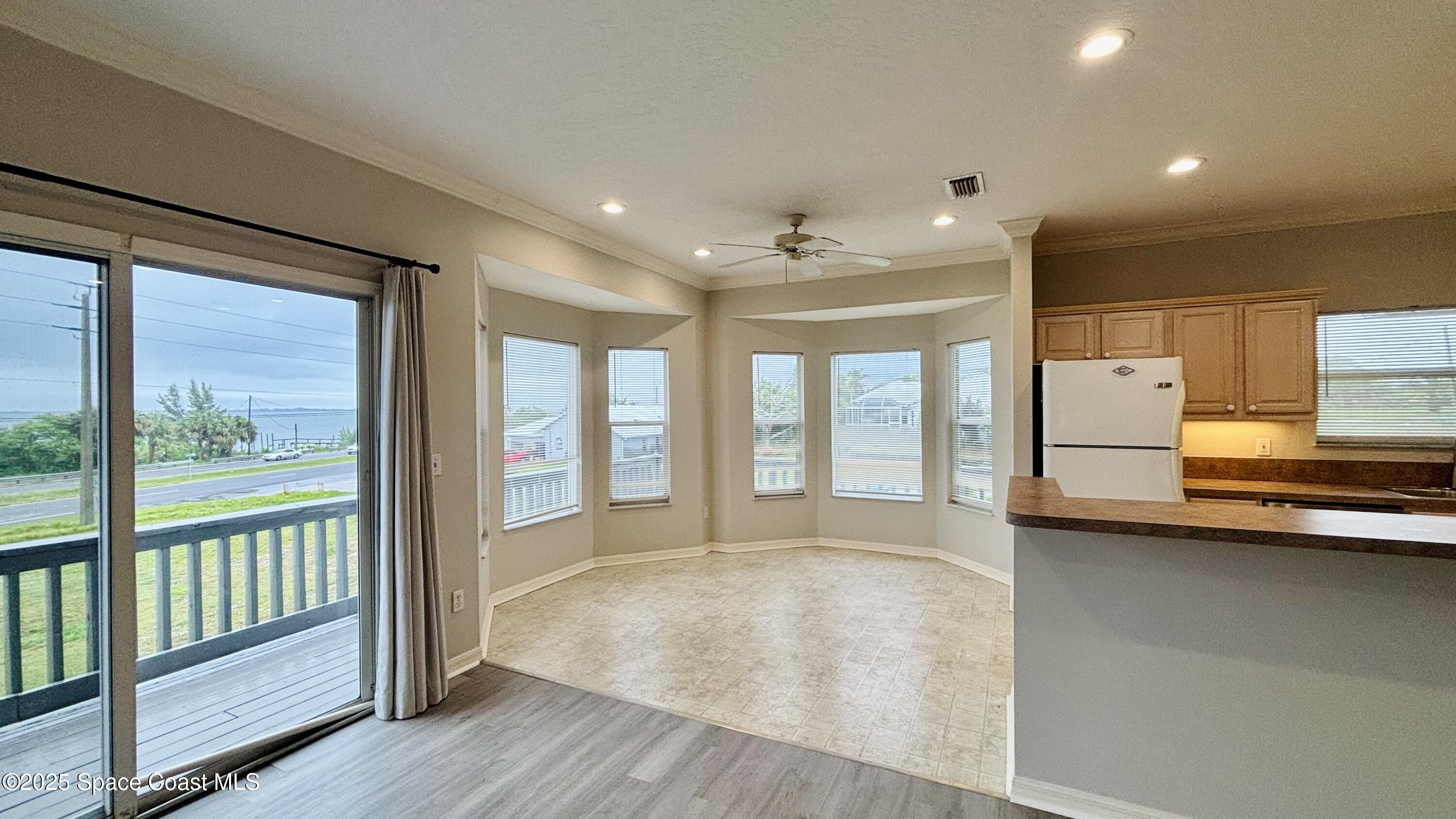 5508 Ambersand Place Grant-Valkaria, FL 32949 - Photo 6 of 30 a view of an empty room with a window